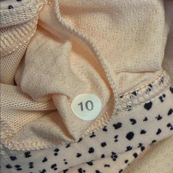 Lululemon Wild Tank in the Heathered Parfait Pink/Speckle Dot color. EC. Size 10 - Picture 7 of 7